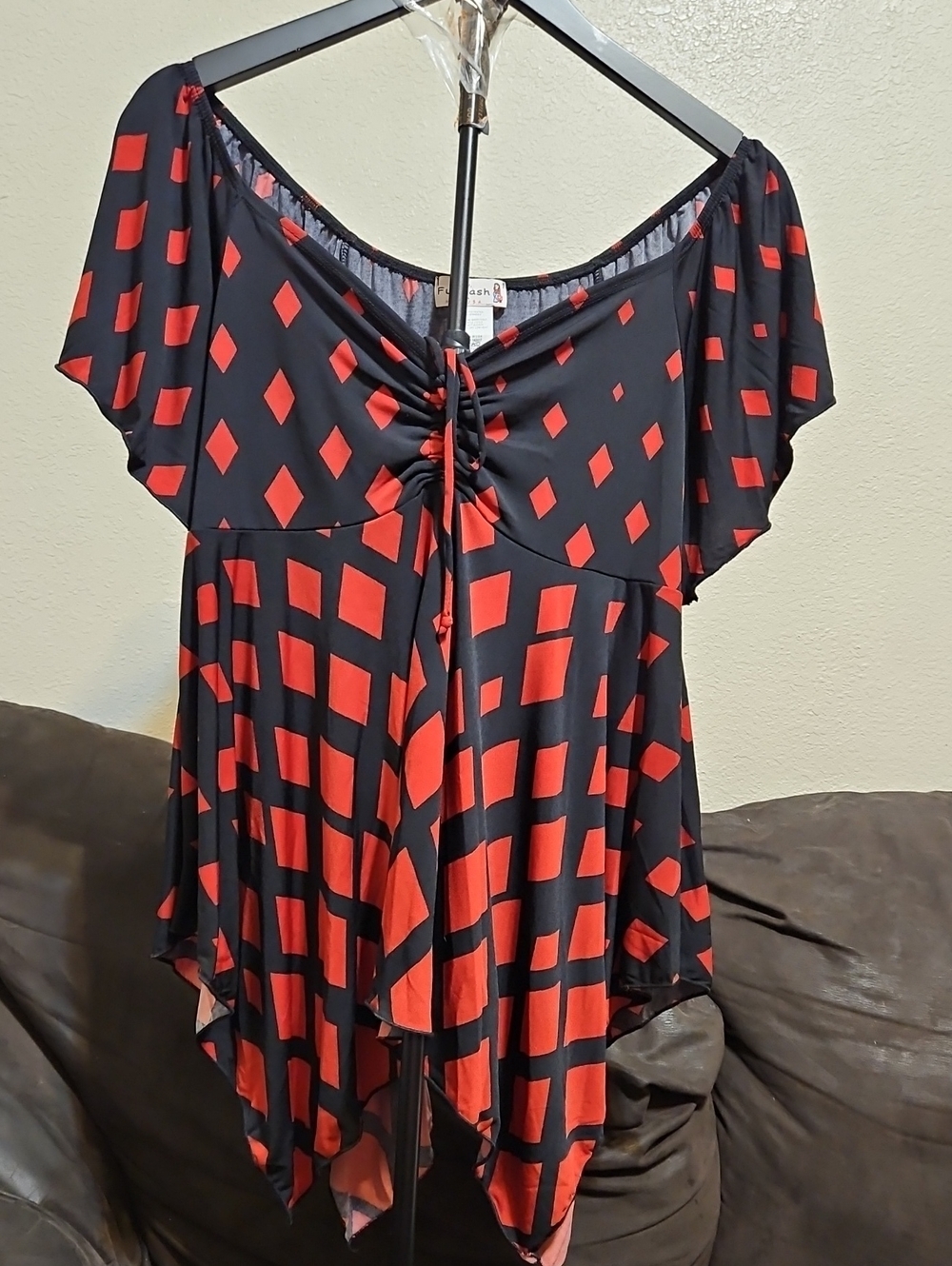 FunFash Black Tunic with Red Geometric Print and Handkerchief Hem